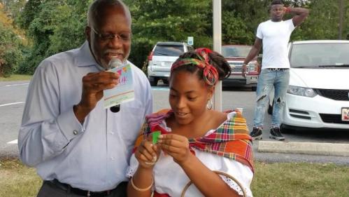 Dominica’s Ambassador Hubert John Charles participating in raffle drawing